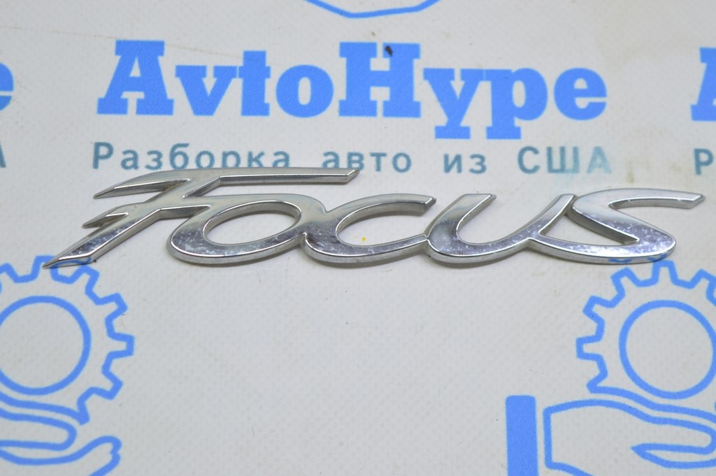 Эмблема надпись FOCUS крышки багажника  Ford Focus mk3 11-18 4d