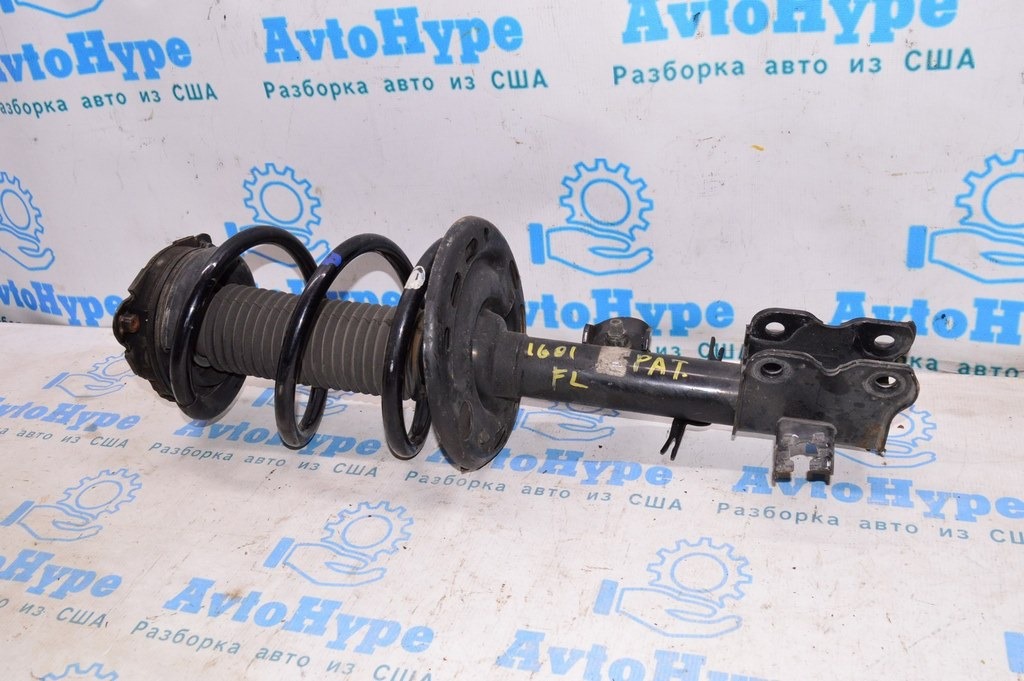 Стойка амортизатора в сборе перед лев Nissan Pathfinder 13- FWD (01)