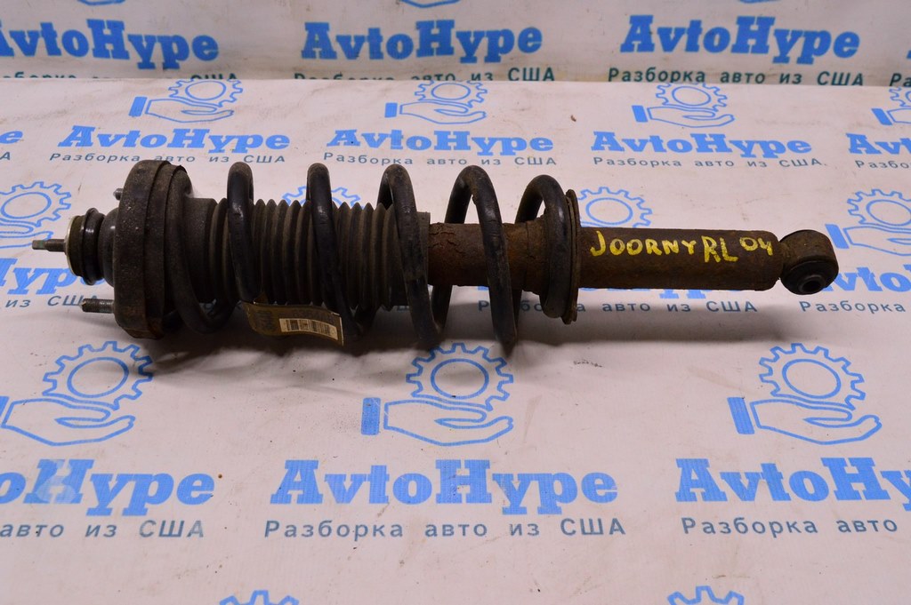 Стойка амортизатора в сборе зад лев Dodge Journey 11- (04)