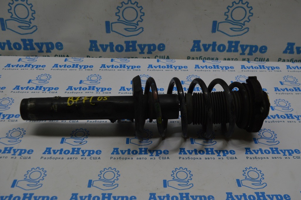 Стойка амортизатора в сборе перед лев VW Passat b7 USA (05)